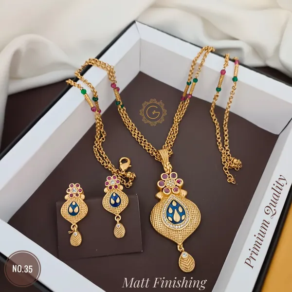 https://cdn-image.blitzshopdeck.in/ShopdeckCatalogue/tr:f-webp,w-600,fo-auto/65784ce6785657b57c9b5ccb/media/Attractive_Design_Copper_Micro_Gold_Plated_Mala_Chain_Pendant_With_Earrings_Set_For_Women_And_Girls_27AOIB1FLV_2024-03-19_1.jpg__Grisha Jewellery