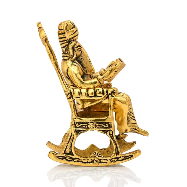 Ganesh_Sitting_on_Swinging_Moving_Chair_Reading_Ramayana_Metal_Gold