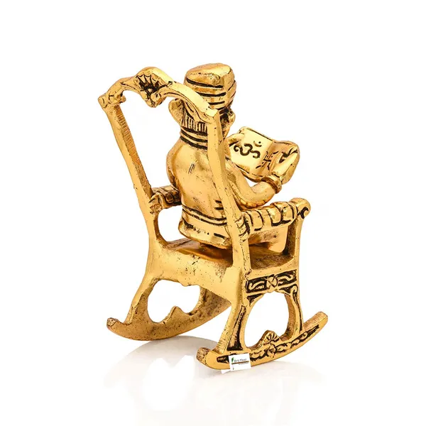 Ganesh_Sitting_on_Swinging_Moving_Chair_Reading_Ramayana_Metal_Gold