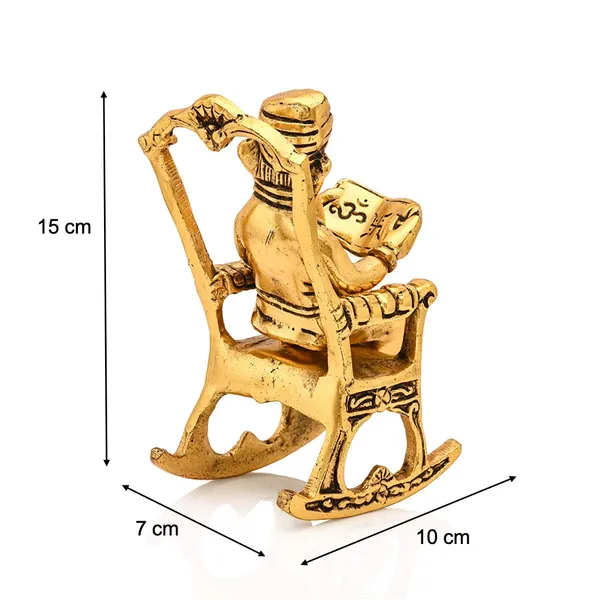Ganesh_Sitting_on_Swinging_Moving_Chair_Reading_Ramayana_Metal_Gold