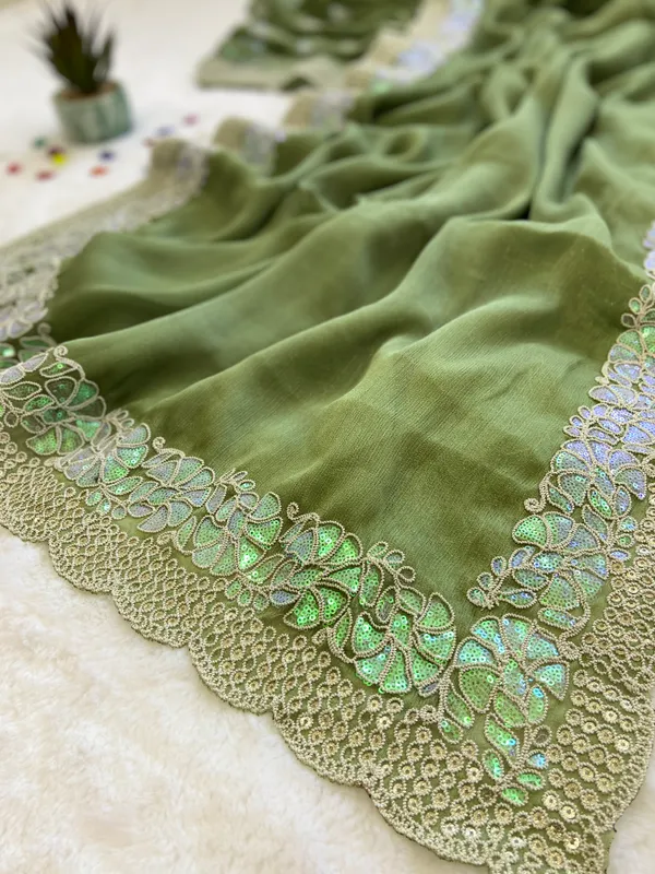 Shimmer_Sitara_Fabric_sarees_with_Beautiful_Embroidery_&_Sequence_Work_With_Attractive_Cutwork_Border