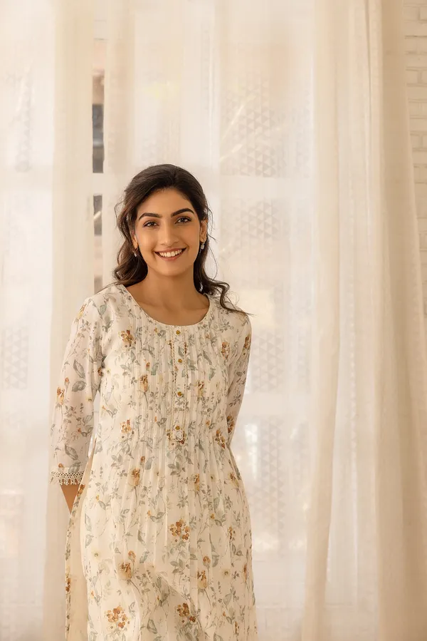 Women_Off_White_A-Line_Sequinned_Kurta_and_Trousers_With_Dupatta
