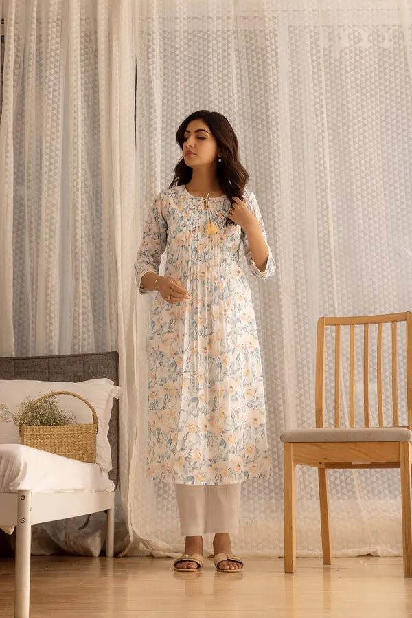 Women_Off_White_A-Line_Sequinned_Kurta_and_Trousers_With_Dupatta