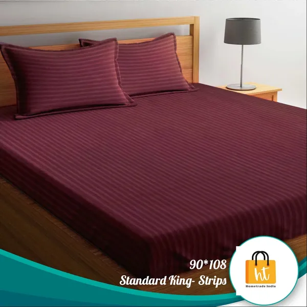 https://cdn-image.blitzshopdeck.in/ShopdeckCatalogue/tr:f-webp,w-600,fo-auto/659bb219596566d560568b3d/media/Bedsheet_Adda_Standard_King_Size__90*108Inches_double_Bedsheet_Stripe_mahroon_Color_With_Two_Pillow_Cover-111-110-mahroon_C1XSWWSBPC_2024-02-15_1.jpeg__100RB
