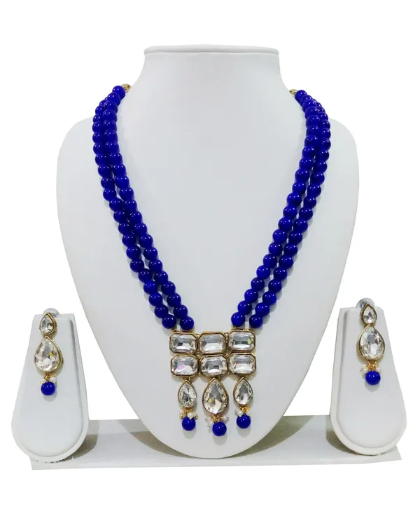 https://cdn-image.blitzshopdeck.in/ShopdeckCatalogue/tr:f-webp,w-600,fo-auto/65b7523602d8dc3ec1da33d5/media/Dhivara_Copper_Plated_Classic_Double_Line_Blue_Pearl_Necklace_Set_For_Women_ODYXW6RV8H_2024-03-19_1.jpg__DHIVARA