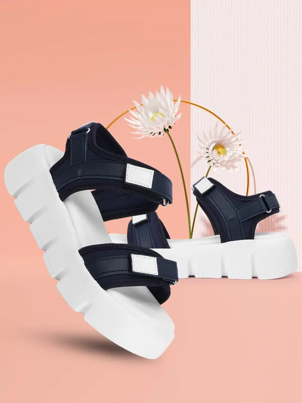 White_women_valcro_strap_printed_platfrom_sandals