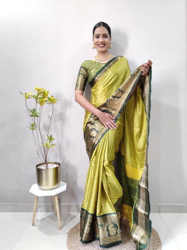 Green_Aquiliq_Woven_Banarasi_Art_Silk,_Cotton_Silk_Saree