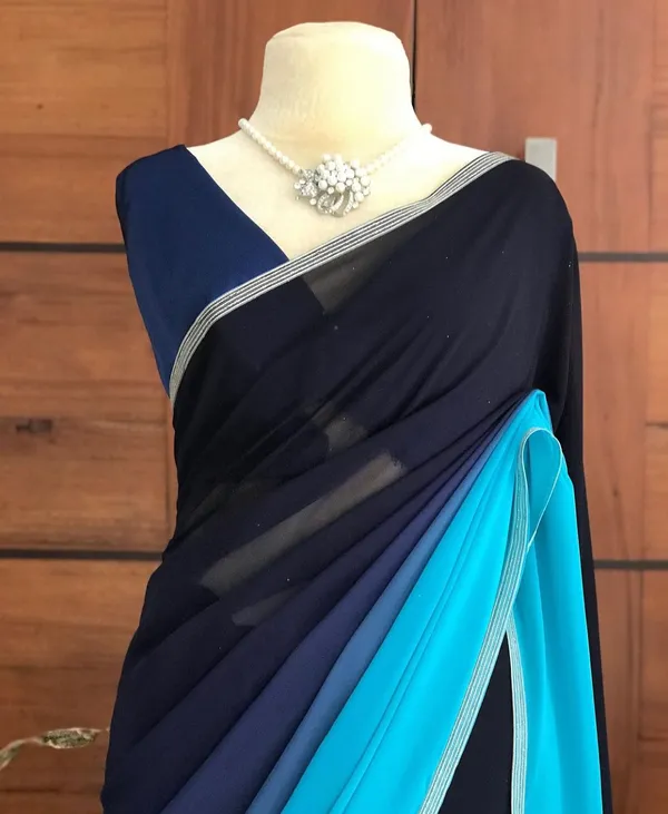 BLUE_SOFT_SMOOTH_GEORGETTEE_SAREE_WITH_EMBROIDERED_LACE
