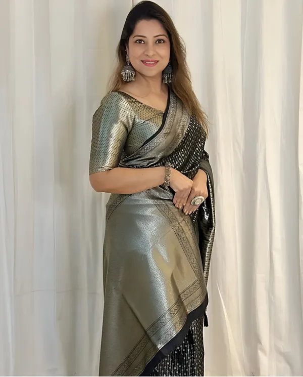 https://cdn-image.blitzshopdeck.in/ShopdeckCatalogue/tr:f-webp,w-600,fo-auto/65e1b534eddd14767aed70e6/media/Black_Tissue_Organza_silk_Saree_adorned_Weaves_in_Silver_Zari_80F3AQ9OJI_2024-04-15_1.jpeg__Aura Silk