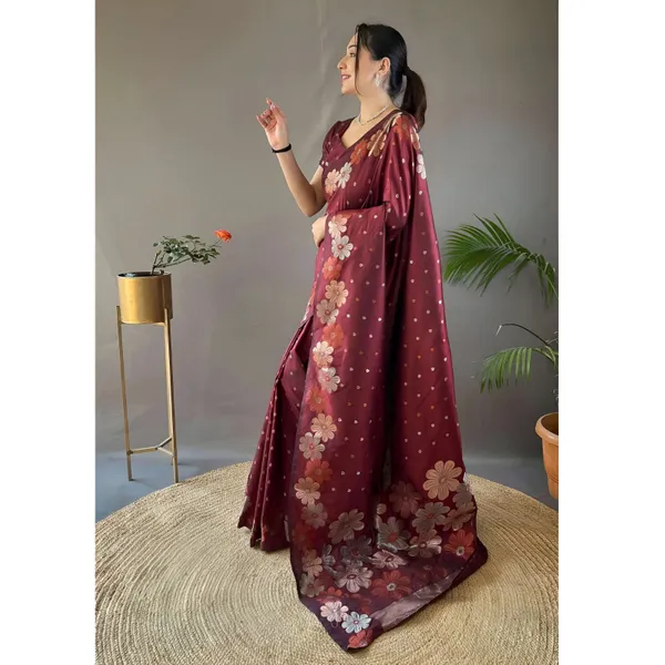 https://cdn-image.blitzshopdeck.in/ShopdeckCatalogue/tr:f-webp,w-600,fo-auto/65e1b534eddd14767aed70e6/media/Floral_Woven_Saree_with_Contrast_Border__Maroon__LUOBE7JB0X_2024-06-22_1.jpeg__Aura Silk