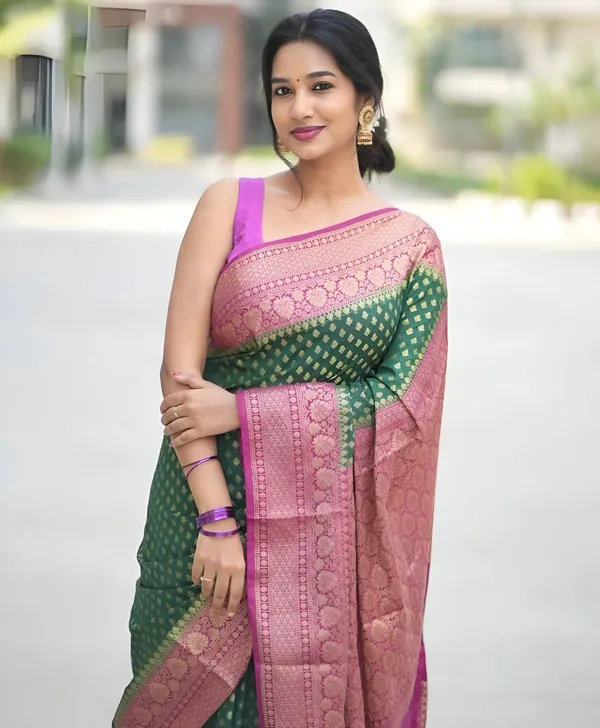 https://cdn-image.blitzshopdeck.in/ShopdeckCatalogue/tr:f-webp,w-600,fo-auto/65e1b534eddd14767aed70e6/media/Green_Banarasi_Silk_Saree_For_Woman_SFLBWXHQL6_2024-04-20_1.jpeg__Aura Silk