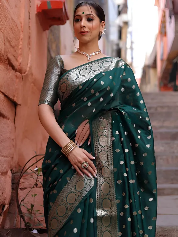 https://cdn-image.blitzshopdeck.in/ShopdeckCatalogue/tr:f-webp,w-600,fo-auto/65e1b534eddd14767aed70e6/media/Green_Saree_in_Soft_Silk_Multi_Color_Zari_Woven_PTEFBWNVQF_2024-04-16_1.png__Aura Silk