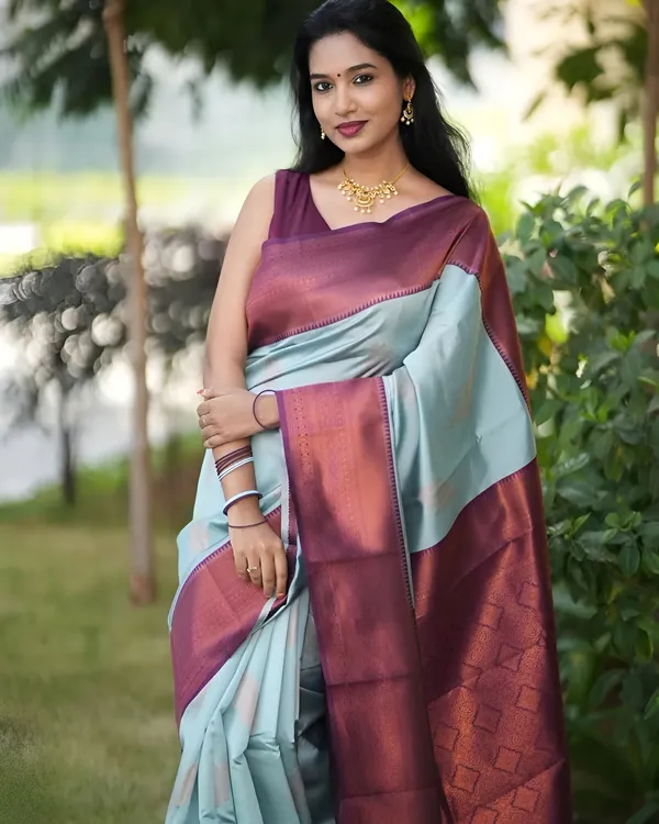 https://cdn-image.blitzshopdeck.in/ShopdeckCatalogue/tr:f-webp,w-600,fo-auto/65e1b534eddd14767aed70e6/media/Mint_Blue_Broad_Border_Weaved_Zari_Silk_Saree_76YAPYHY8F_2024-04-18_1.jpeg__Aura Silk