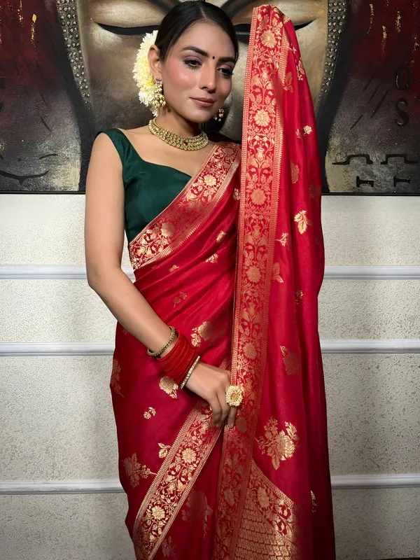 https://cdn-image.blitzshopdeck.in/ShopdeckCatalogue/tr:f-webp,w-600,fo-auto/65e1b534eddd14767aed70e6/media/Red_Banarasi_Silk_Saree__TT86NRPJUT_2024-05-13_1.jpeg__Aura Silk