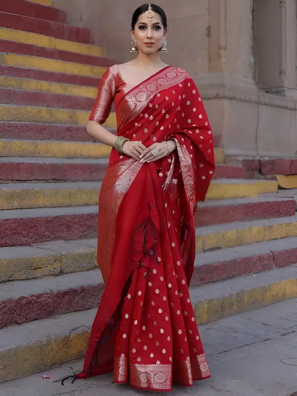 https://cdn-image.blitzshopdeck.in/ShopdeckCatalogue/tr:f-webp,w-600,fo-auto/65e1b534eddd14767aed70e6/media/Red_Saree_in_Soft_Silk_Multi_Color_Zari_Woven_IXQ33AMDUJ_2024-04-16_1.png__Aura Silk