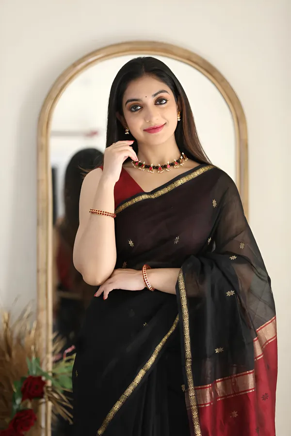 https://cdn-image.blitzshopdeck.in/ShopdeckCatalogue/tr:f-webp,w-600,fo-auto/65e1b534eddd14767aed70e6/media/Solid_Plain_Banarasi_Pure_Silk_Saree___Black__SP8GJXPZBR_2024-04-11_1.jpeg__Aura Silk