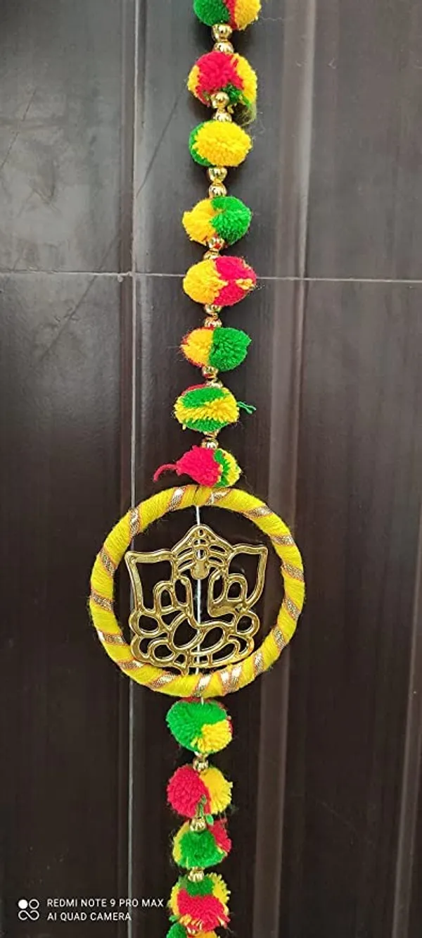 Handmade_Wall_Door_5_ft.Strings_Hanging_Pom_Pom_Torans_Garland_Bandhwar_with_Golden_Bells_Decoration_Item_for_Home_DecorDiwali_Festival,Navratri,Wedding_(5_FT_6_Strings)
