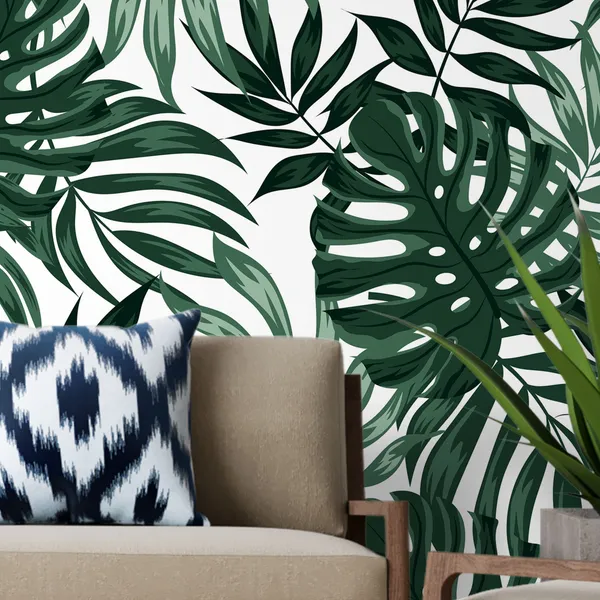 Trending_tropical_pattern_with_plants_and_leaves_on_a_white_background._Hawaiian_style._Jungle_leaves._Botanical_pattern_with_exotic_leaves.