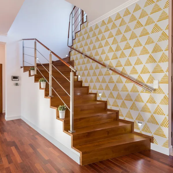 Seamless_hand_drawn_geometric_pattern_with_yellow_striped_triangles_Mural_Wallpaper.