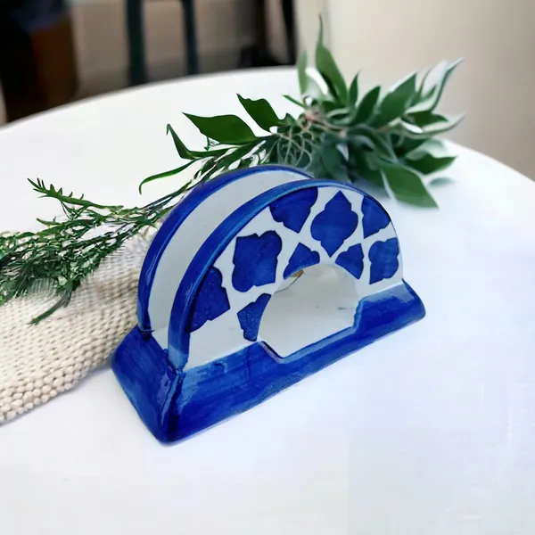 https://cdn-image.blitzshopdeck.in/ShopdeckCatalogue/tr:f-webp,w-600,fo-auto/65fc37fa02d8dc3ec18ca262/media/MADARKS_Napkin_Holder_Tissue_Paper_Holder_in_Handmade_Ceramic_Pottery__Blue__Perfect_for_Kitchen_and_Dinning_Table___DLPRJI7ZF5_2024-03-29_1.jpg__Madarks