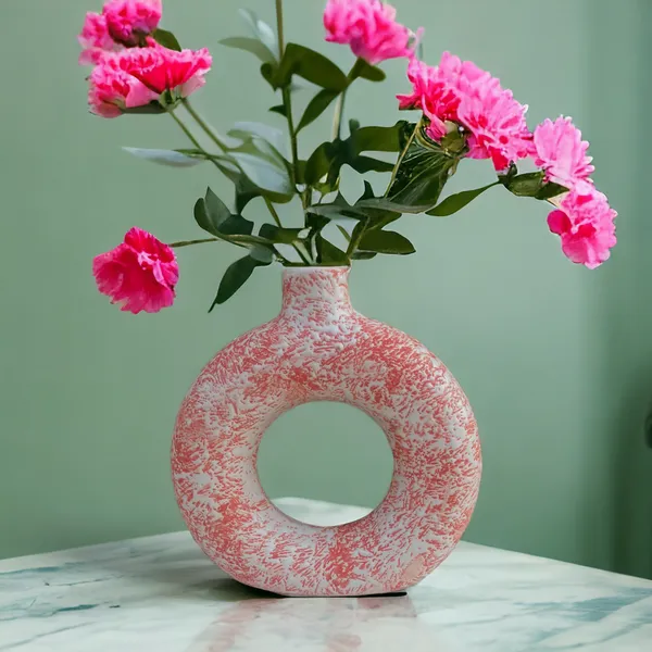 https://cdn-image.blitzshopdeck.in/ShopdeckCatalogue/tr:f-webp,w-600,fo-auto/65fc37fa02d8dc3ec18ca262/media/Madarks_Ceramic_Donut_Vase__Flower_Vase_Pampas_Grass_Vase__Color_Red__Bedroom_Dining_Table__Size___6_Inch__M9284TW37N_2024-03-27_1.jpg__Madarks