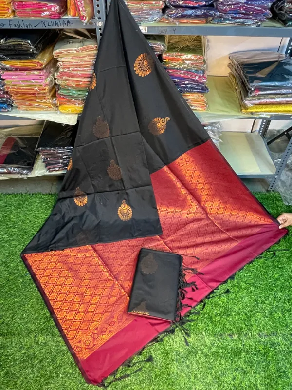 https://cdn-image.blitzshopdeck.in/ShopdeckCatalogue/tr:f-webp,w-600,fo-auto/66274cacebb827b5d63c9765/media/Kanjivaram_Tissue_Border_Soft_Silk_Saree__Black___Maroon__AX75VQ5Z9F_2024-06-07_1.png__Nivnyaa Fashion