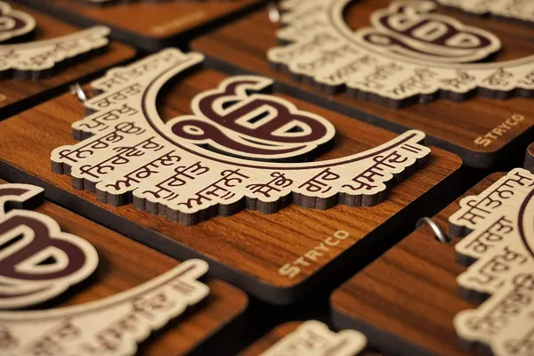 3D_Golden_Brown_3.75x2.75_Inches_Ek_Onkar_Car_Hanging__Punjabi_Gift_Item_|_Sikh_Mool_Mantra_Wooden_Car_Hanging_Pendant_|_Ik_Onkar_|_Sikh_Mul_Mantra_|_Sikh_Gift_Ideas_|_Sikh_Gifts_|_Dual_Sided_Design