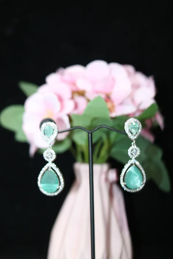 AD_EARING_WITH_LIGHT_BLUE_STONE