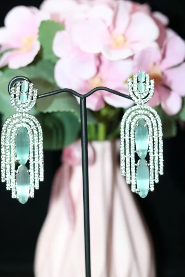 AD_EARING_WITH_LIGHT_BLUE_STONE
