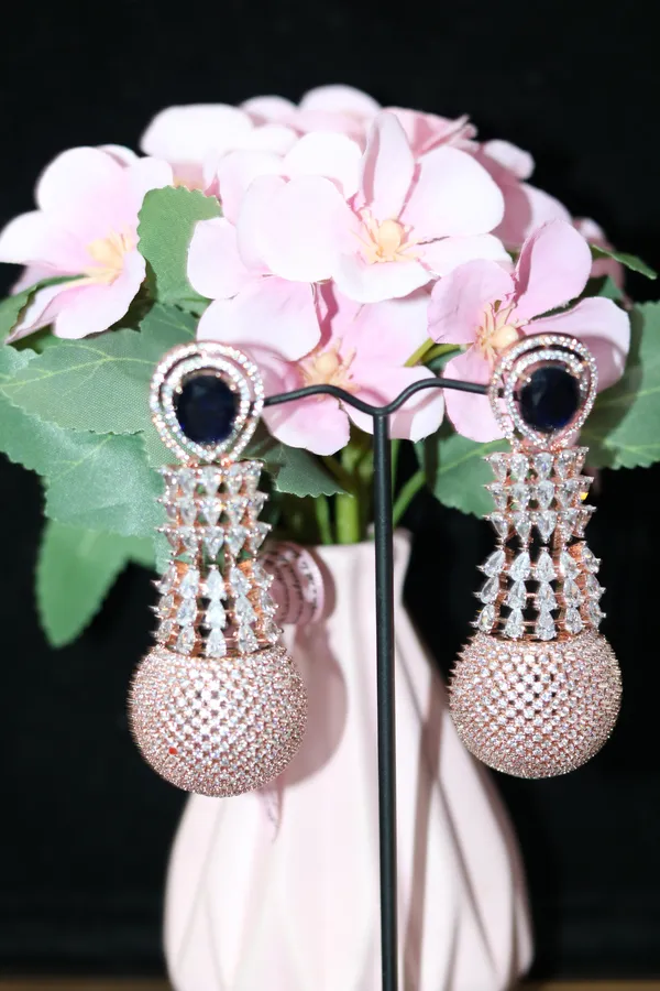 AD_EARING__ROSE_GOLD_POLISH_WITH_BLACK_STONE