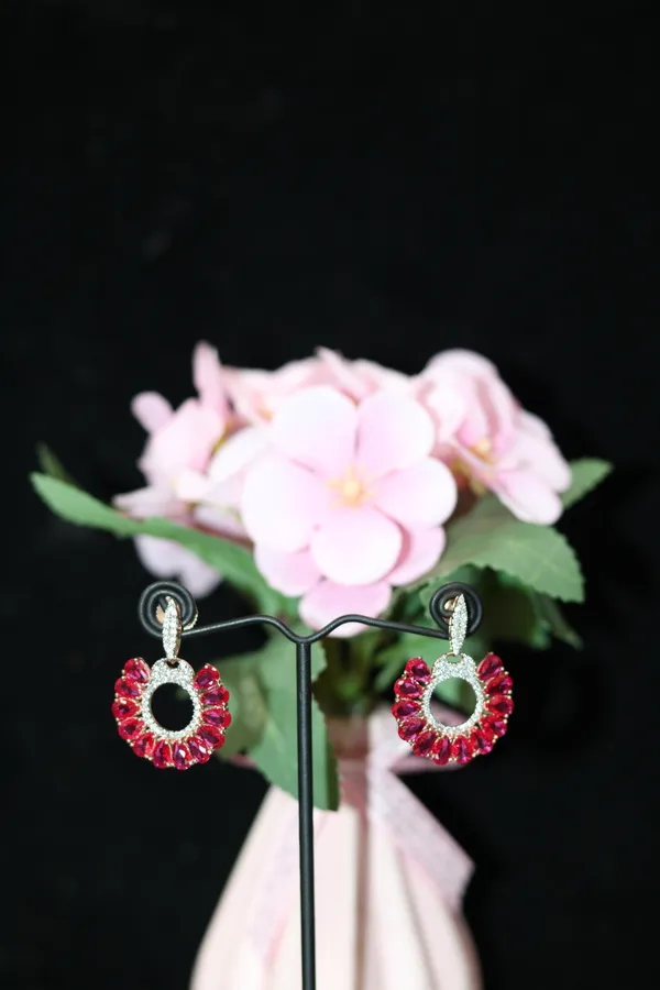 ROSE_GOLD_WITH_RED_STONE