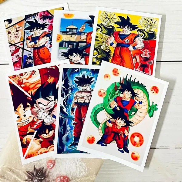 Combo_Pack_Of_4_White_Anime_Gift_Pack_|_Mug,_Keychain,_Ceramic_Tile_With_Stand_&_6_Mini_Posters_|_The_Ultimate_Naruto,_Goku,_Luffy,_Itachi_Anime_Fans_Collection._(Anime_-_Goku)