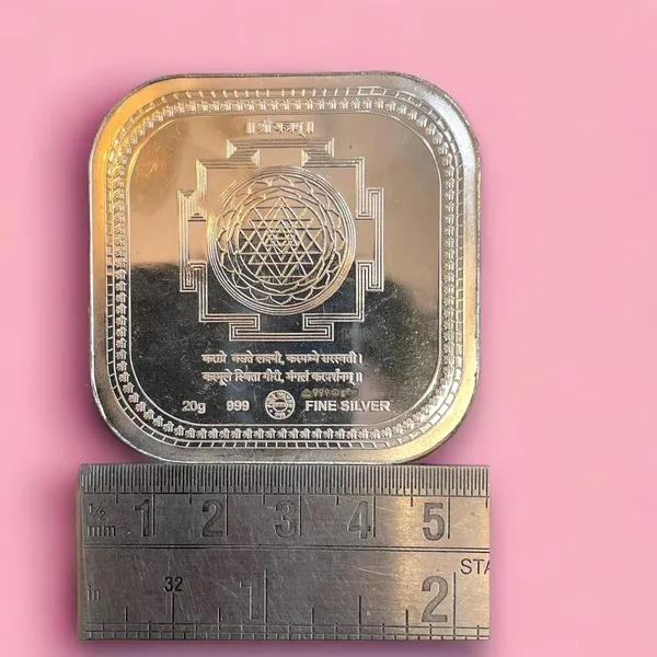 Silver_999_Purity_Hallmark_Coin,_Colorfull_Laxmi_Ganesh_Saraswati_Trimoorti_Coin_For_Diwali_(20_Gm_999)