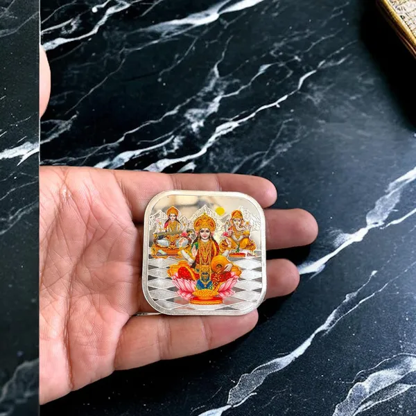 Silver_999_Purity_Hallmark_Coin,_Colorfull_Laxmi_Ganesh_Saraswati_Trimoorti_Coin_For_Diwali_(20_Gm_999)