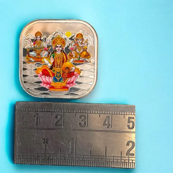 Silver_999_Purity_Hallmark_Coin,_Colorfull_Laxmi_Ganesh_Saraswati_Trimoorti_Coin_For_Diwali_(5_Gm_999)