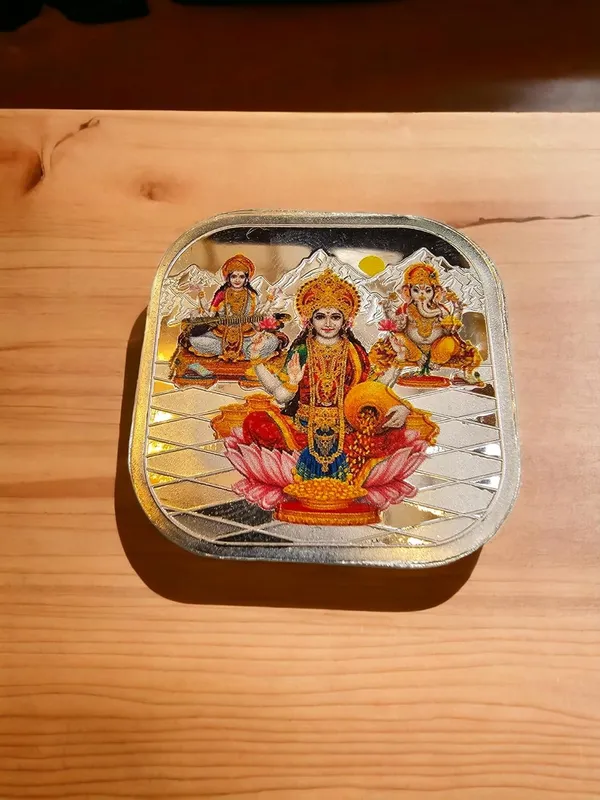 Silver_999_Purity_Hallmark_Coin,_Colorfull_Laxmi_Ganesh_Saraswati_Trimoorti_Coin_For_Diwali_(5_Gm_999)