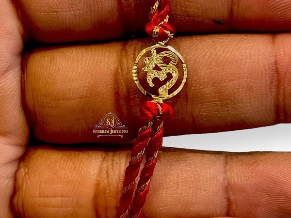 Silver_Om_Sathiya_20K_Gold_Rakhi_Bracelet_For_Men/Boys_(Yellow_Gold_Rakhi_For_Brother)_(Sathiya)
