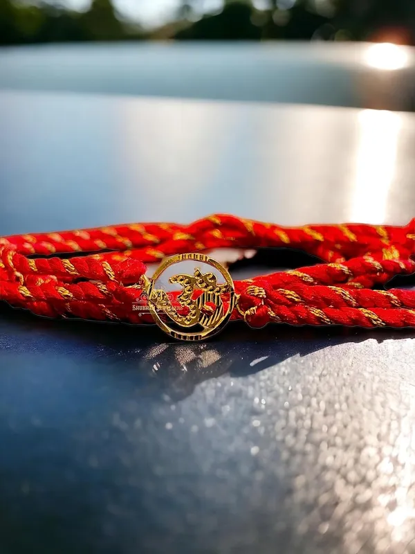 Silver_Om_Sathiya_20K_Gold_Rakhi_Bracelet_For_Men/Boys_(Yellow_Gold_Rakhi_For_Brother)_(Sathiya)
