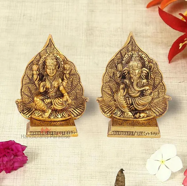 Golden_Metal_Lakshmi_Ganesh_Pair_With_Leaf_Background,_5_Inch,_(Set_Of_2_Piece)