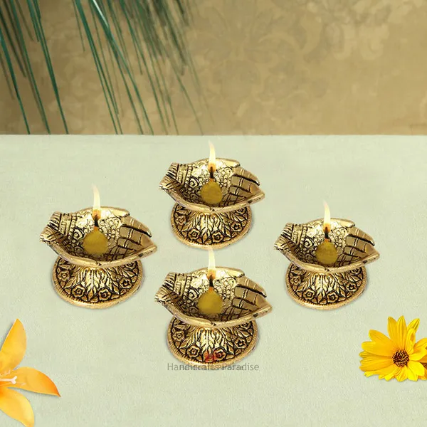 Golden_Diya_With_Intricate_Design_In_Metal_,2_Inches_(Set_Of_4)