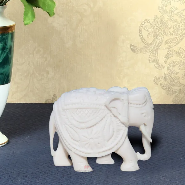 White_Resin_Elephant_With_Carving,_2_Inch