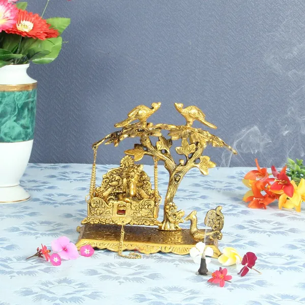 Golden_Krishna_Seated_On_Jhoola_Hanging_On_Tree_Metal_Figurine