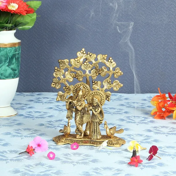 Golden_Radha_Krishna_Metal_Figurine_Standing_On_Base_With_2_Peacocks_And_A_Tree_In_Backdrop