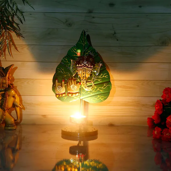 Green_Ganesh_Tealight_Showpiece_For_Home_Decor_In_Wrought_Iron_,_10_Inch