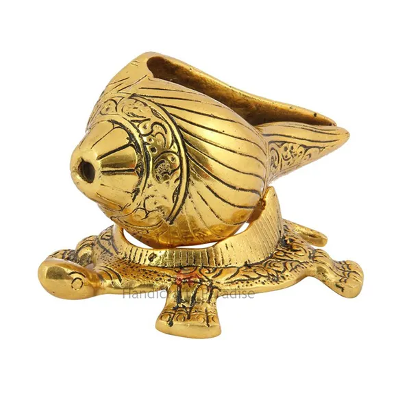 Golden_Shankh_Placed_On_Tortoise_Showpiece,_3_Inch