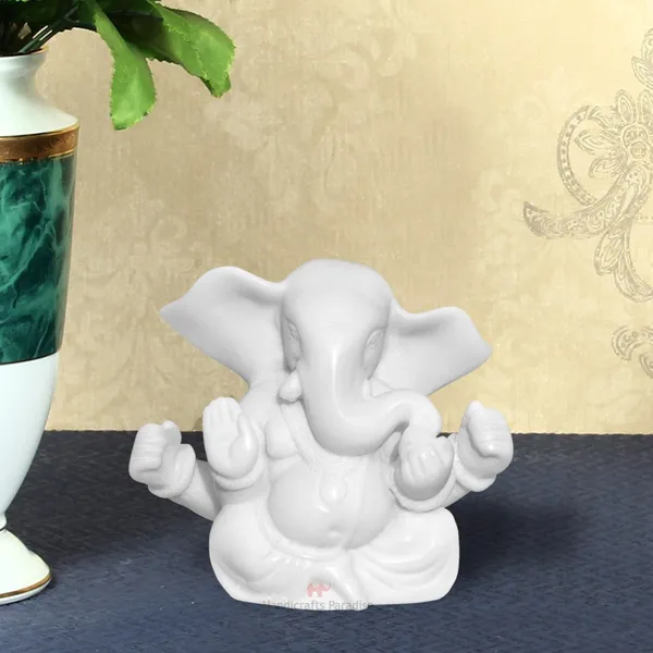 White_Resin_Ganesha_With_Big_Open_Ears_Idol,_2.75_Inch
