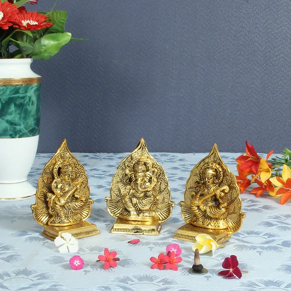 Golden_Antique_Lakshmi_Ganesh_And_Saraswati_Ji_Idol_With_Leaf_Backdrop
