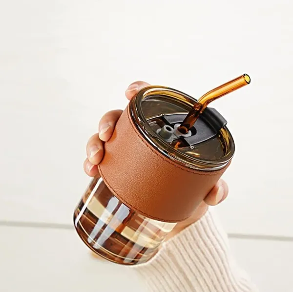 Transparent_&_Brown_PU_Leather_Sleeve_Glass_Tumbler_Mug_with_Lid,_Coffee_Sipper_with_Straw_and_Protective_Anti-Skid_Leather_Sleeve_for_Hot_and_Cold_Beverages_(435ml)