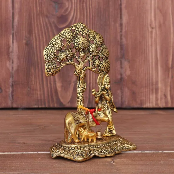 Golden_Metal_Krishna_With_Cow_Standing_Under_Tree_Plying_Flute_Decorative_Showpiece
