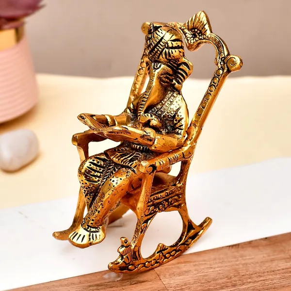Gold_Ganesh_Reading_Ramayana_On_Chair_Decorative_Showpiece